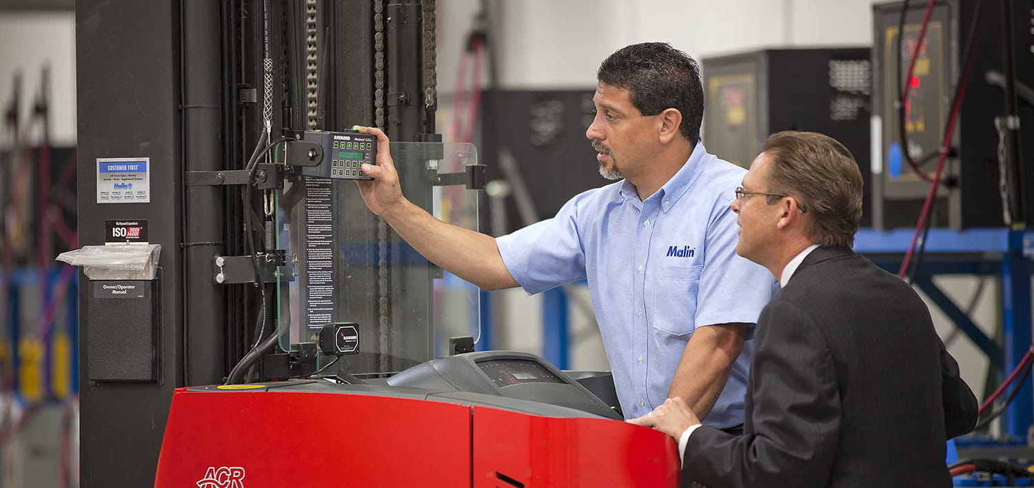 Man demonstrating use of warehouse labor management practices