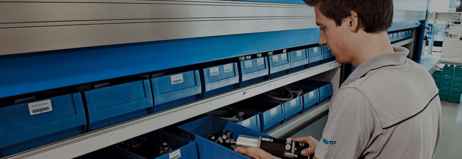 Employee using warehouse order picking technology